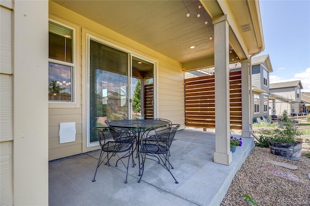 15619 Syracuse Way, Thornton, CO 80602 - view of patio / terrace with outdoor dining space and stairs