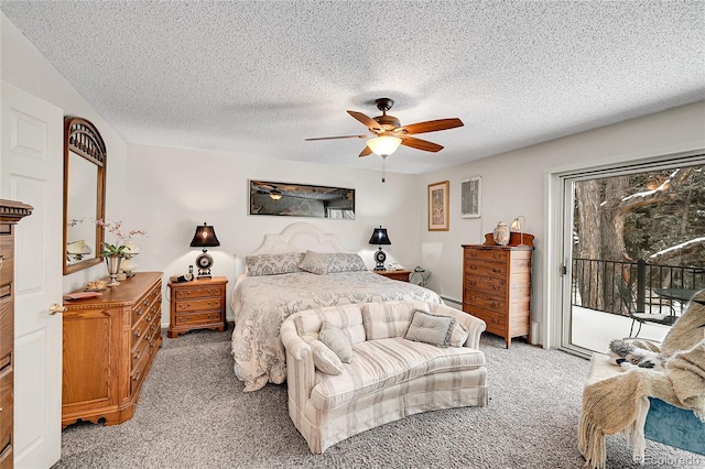 bedroom with carpet floors, a textured ceiling, access to exterior, and ceiling fan