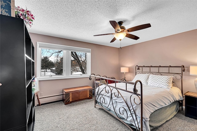 bedroom with a textured ceiling, carpet floors, ceiling fan, and baseboard heating