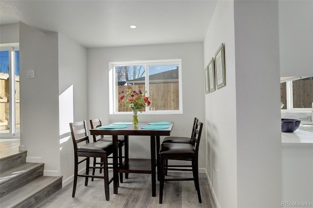 dining area featuring hardwood / wood-style floors