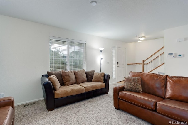 25812 E Cedar Pl, Aurora, CO 80018 - living room featuring carpet floors, stairs, and baseboards