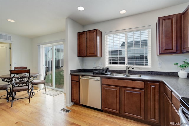 25812 E Cedar Pl, Aurora, CO 80018 - kitchen with stainless steel dishwasher, a sink, plenty of natural light, light wood-style floors, and recessed lighting