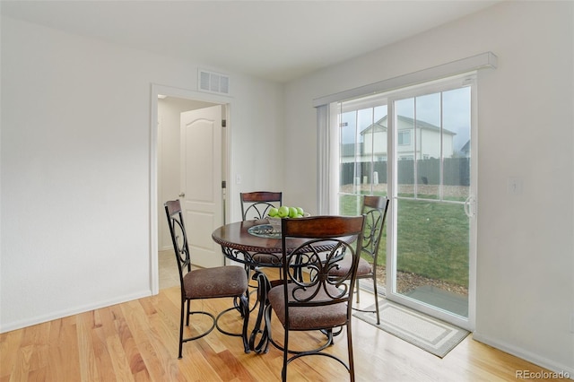 25812 E Cedar Pl, Aurora, CO 80018 - dining room with light wood-style flooring and baseboards