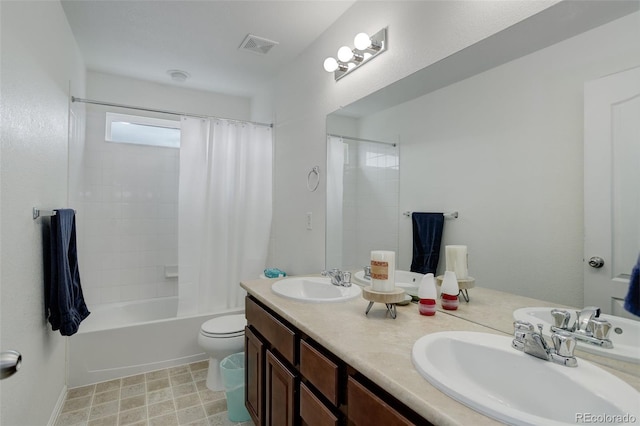 25812 E Cedar Pl, Aurora, CO 80018 - full bath with toilet, double vanity, and shower / tub combo