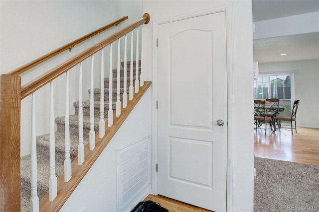 25812 E Cedar Pl, Aurora, CO 80018 - stairs with wood finished floors