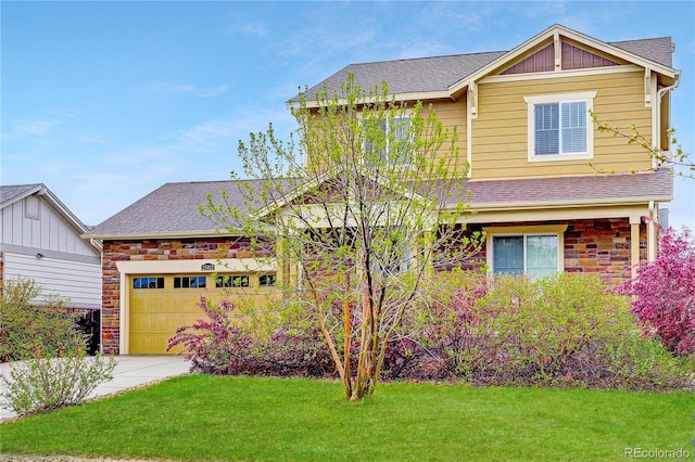 25812 E Cedar Pl, Aurora, CO 80018 - view of front of house with stone siding, roof with shingles, board and batten siding, a front yard, and concrete driveway
