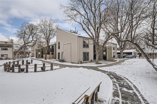 view of snow covered property