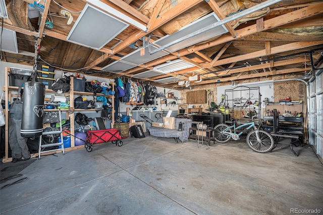 garage with a workshop area