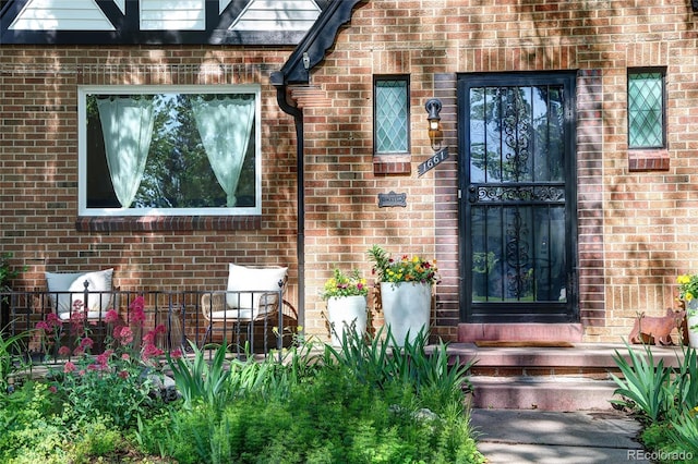 1661 Oneida St, Denver, CO 80220 - property entrance featuring brick siding