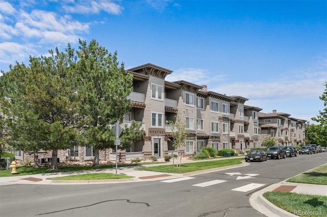 16600 Las Ramblas Ln Unit A, Parker, CO 80134 - view of building exterior with a residential view