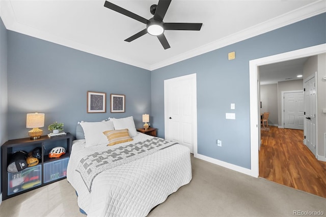 16600 Las Ramblas Ln Unit A, Parker, CO 80134 - bedroom featuring ornamental molding, ceiling fan, a closet, and carpet floors