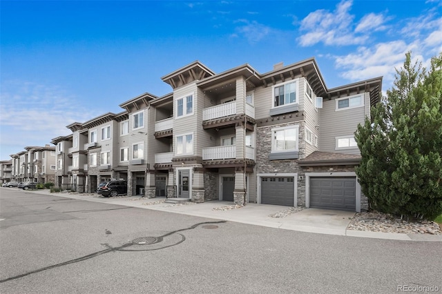 16600 Las Ramblas Ln Unit A, Parker, CO 80134 - view of building exterior featuring a residential view, a garage, and driveway