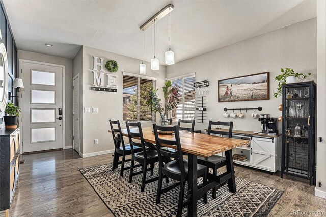 10796 Truckee Cir, Commerce City, CO 80022 - dining room with baseboards and dark wood-style floors