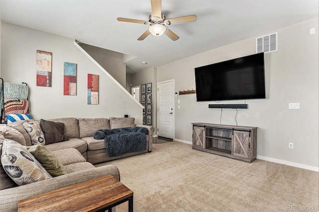 10796 Truckee Cir, Commerce City, CO 80022 - living area with carpet floors, ceiling fan, baseboards, and stairs