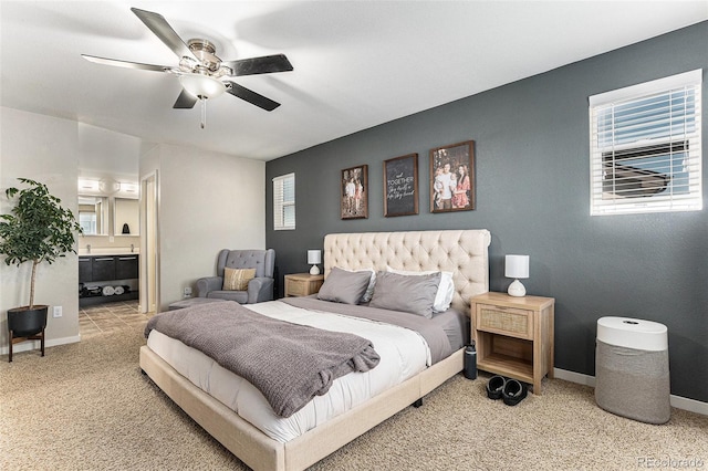 10796 Truckee Cir, Commerce City, CO 80022 - carpeted bedroom featuring multiple windows, baseboards, and connected bathroom