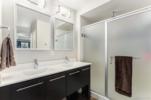 10796 Truckee Cir, Commerce City, CO 80022 - full bathroom featuring a stall shower and double vanity