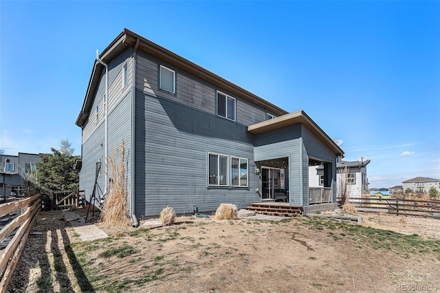 10796 Truckee Cir, Commerce City, CO 80022 - back of property featuring a fenced backyard