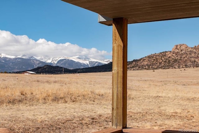 view of mountain feature with a rural view