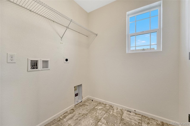 clothes washing area featuring hookup for a gas dryer, light tile patterned floors, electric dryer hookup, and washer hookup