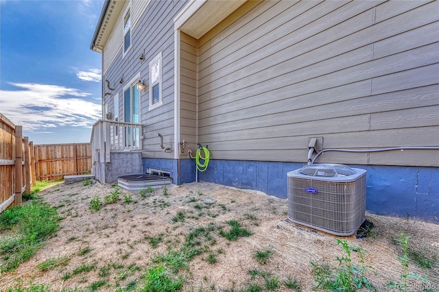 view of home's exterior featuring cooling unit