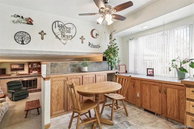 interior space with a ceiling fan