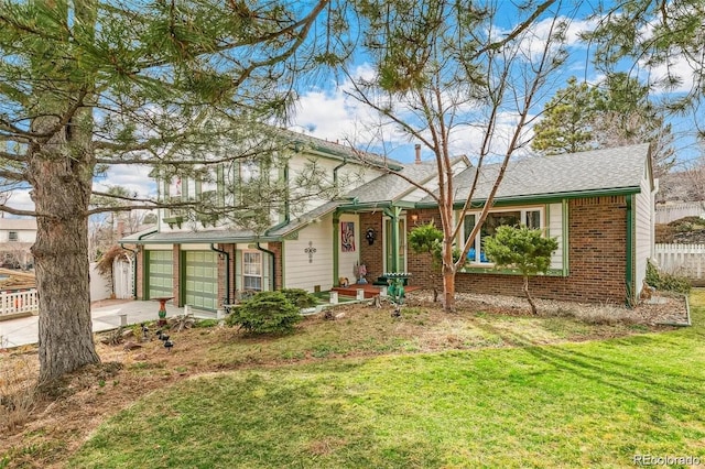 view of front facade featuring driveway, brick siding, fence, an attached garage, and a front yard