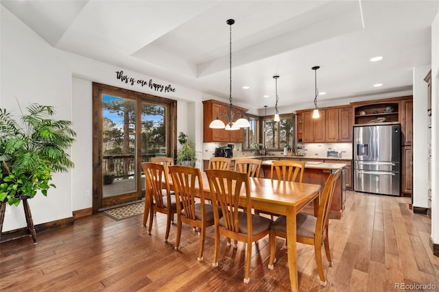 1524 Fox Acres Dr Unit 412, Red Feather Lakes, CO 80545 - dining room featuring light wood finished floors, recessed lighting, and a raised ceiling