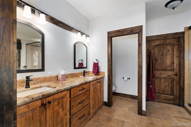 1524 Fox Acres Dr Unit 412, Red Feather Lakes, CO 80545 - bathroom with double vanity and toilet