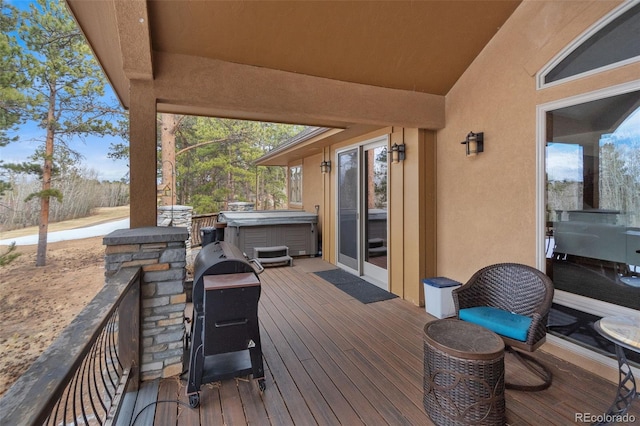 1524 Fox Acres Dr Unit 412, Red Feather Lakes, CO 80545 - wooden terrace with a hot tub
