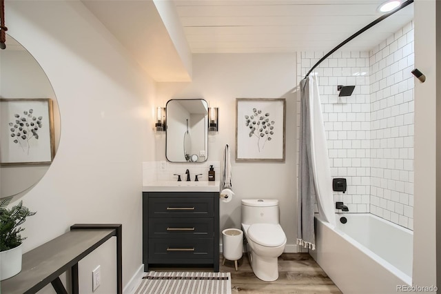 16626 Ouray Rd W, Pine, CO 80470 - bathroom with toilet, wood finished floors, vanity, shower / tub combo, and baseboards