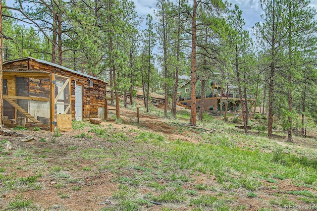 16626 Ouray Rd W, Pine, CO 80470 - view of yard with exterior structure and an outbuilding