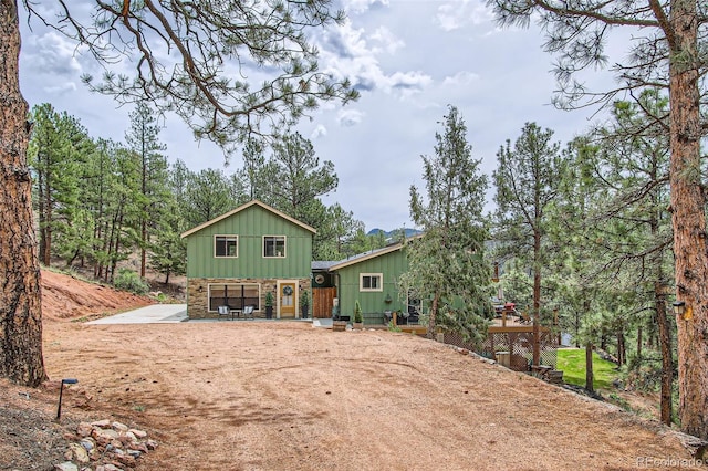 16626 Ouray Rd W, Pine, CO 80470 - view of front facade with board and batten siding and stone siding