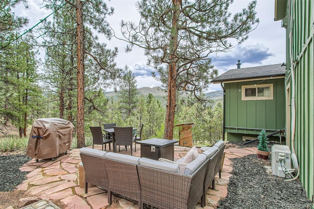 16626 Ouray Rd W, Pine, CO 80470 - view of patio with a grill and outdoor dining area