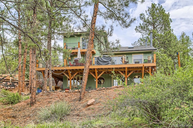 16626 Ouray Rd W, Pine, CO 80470 - rear view of property featuring a balcony and a wooden deck