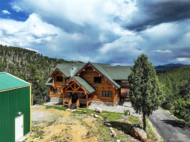 log home with a mountain view