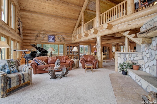 living room with log walls, high vaulted ceiling, wooden ceiling, beamed ceiling, and carpet floors