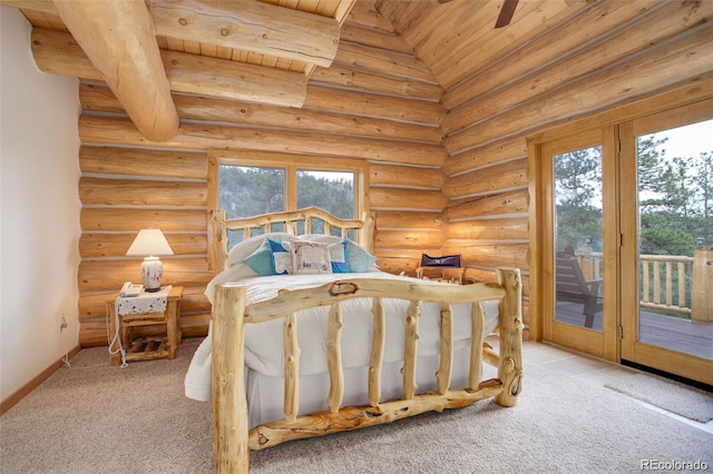 bedroom featuring access to outside, multiple windows, rustic walls, and wooden ceiling