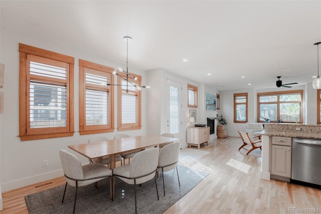 2034 Newton St, Denver, CO 80211 - dining space featuring light wood-style floors, baseboards, recessed lighting, and a ceiling fan