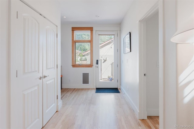 2034 Newton St, Denver, CO 80211 - entrance foyer with light wood-style floors and baseboards