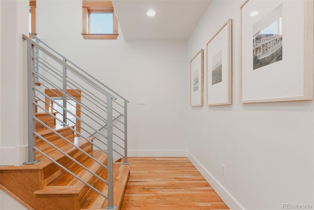 2034 Newton St, Denver, CO 80211 - stairs with wood finished floors, baseboards, and recessed lighting