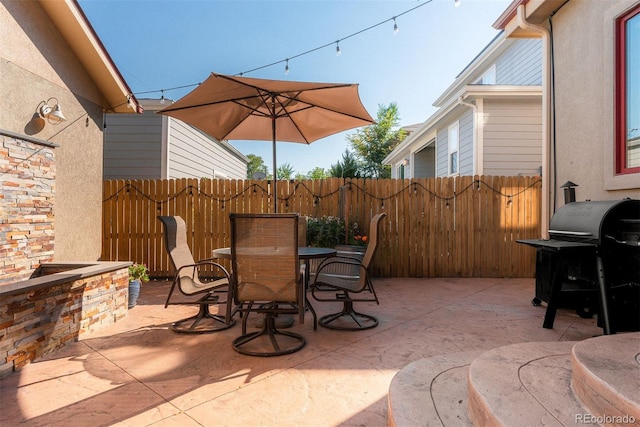 2034 Newton St, Denver, CO 80211 - view of patio / terrace featuring a grill and outdoor dining area