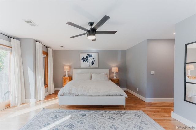 2034 Newton St, Denver, CO 80211 - bedroom with light wood-style floors and a ceiling fan