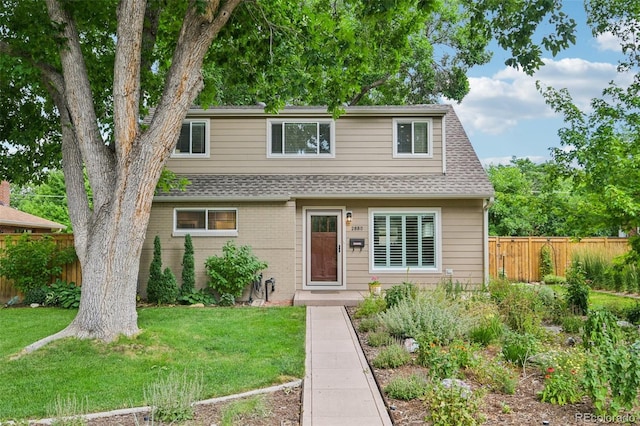 2880 S High St, Denver, CO 80210 - view of front of home with roof with shingles and brick siding