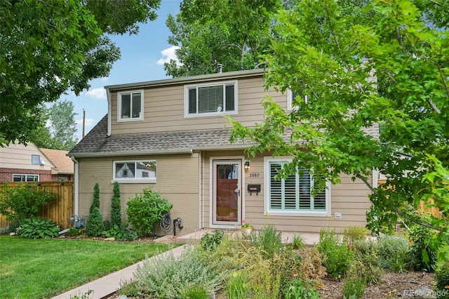 2880 S High St, Denver, CO 80210 - view of front facade featuring brick siding and roof with shingles