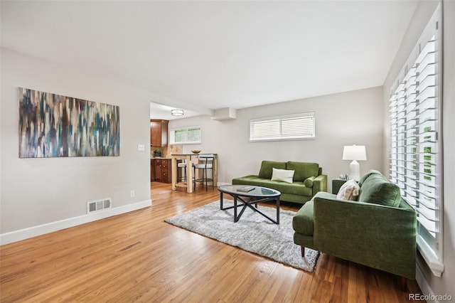 2880 S High St, Denver, CO 80210 - living area featuring light wood finished floors
