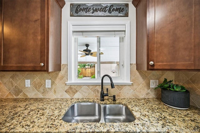 2880 S High St, Denver, CO 80210 - kitchen with decorative backsplash and light stone countertops
