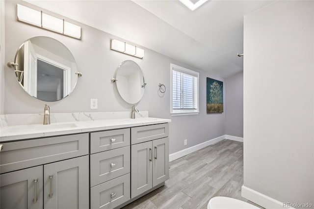 2880 S High St, Denver, CO 80210 - full bath with double vanity and wood finished floors