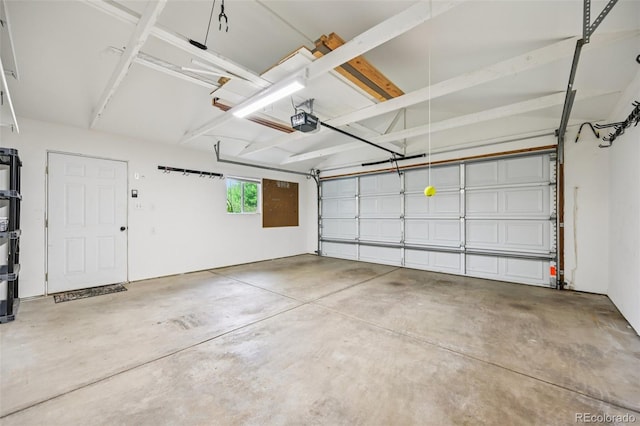 2880 S High St, Denver, CO 80210 - garage featuring a garage door opener