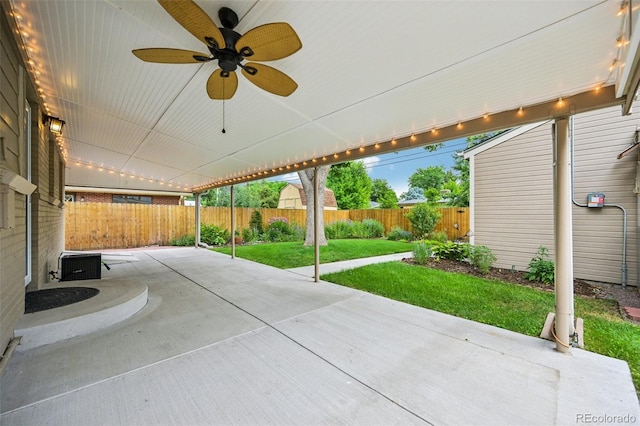 2880 S High St, Denver, CO 80210 - fenced backyard with a patio area and ceiling fan