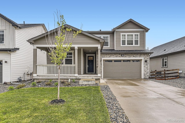 1420 E Witherspoon Dr, Elizabeth, CO 80107 - view of front of house with covered porch, concrete driveway, and a garage